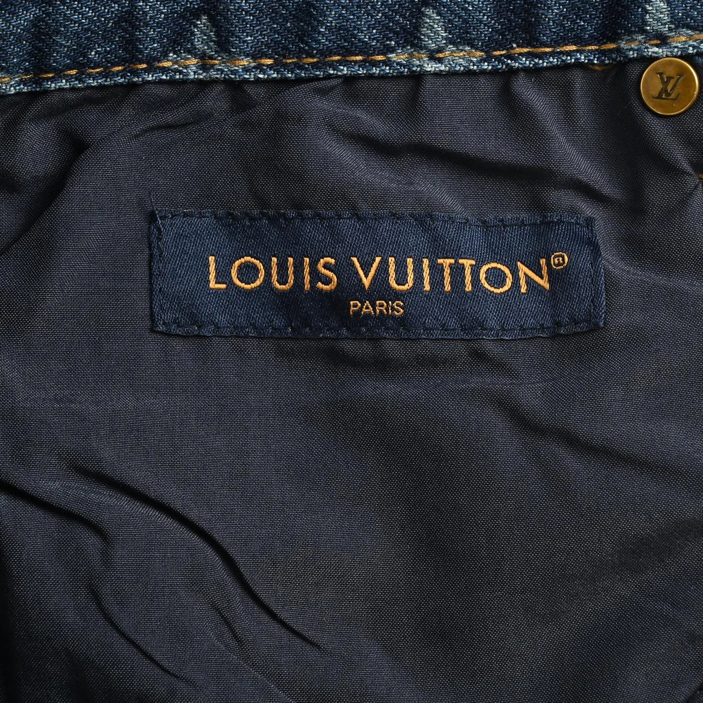 Louis Vuitton/Louis Vuitton all-over logo daisy embroidered jeans